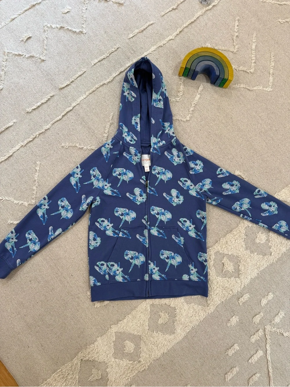 Navy Blue Zip-Up Hoodie with glowing dinosaur fossil Print